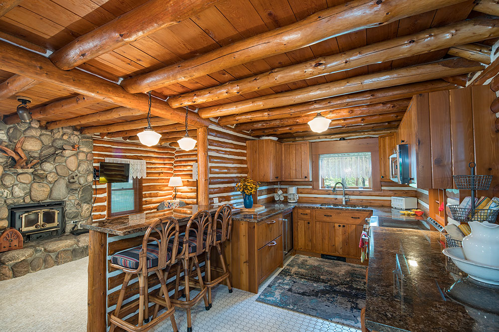 Log cabin kitchen and great room